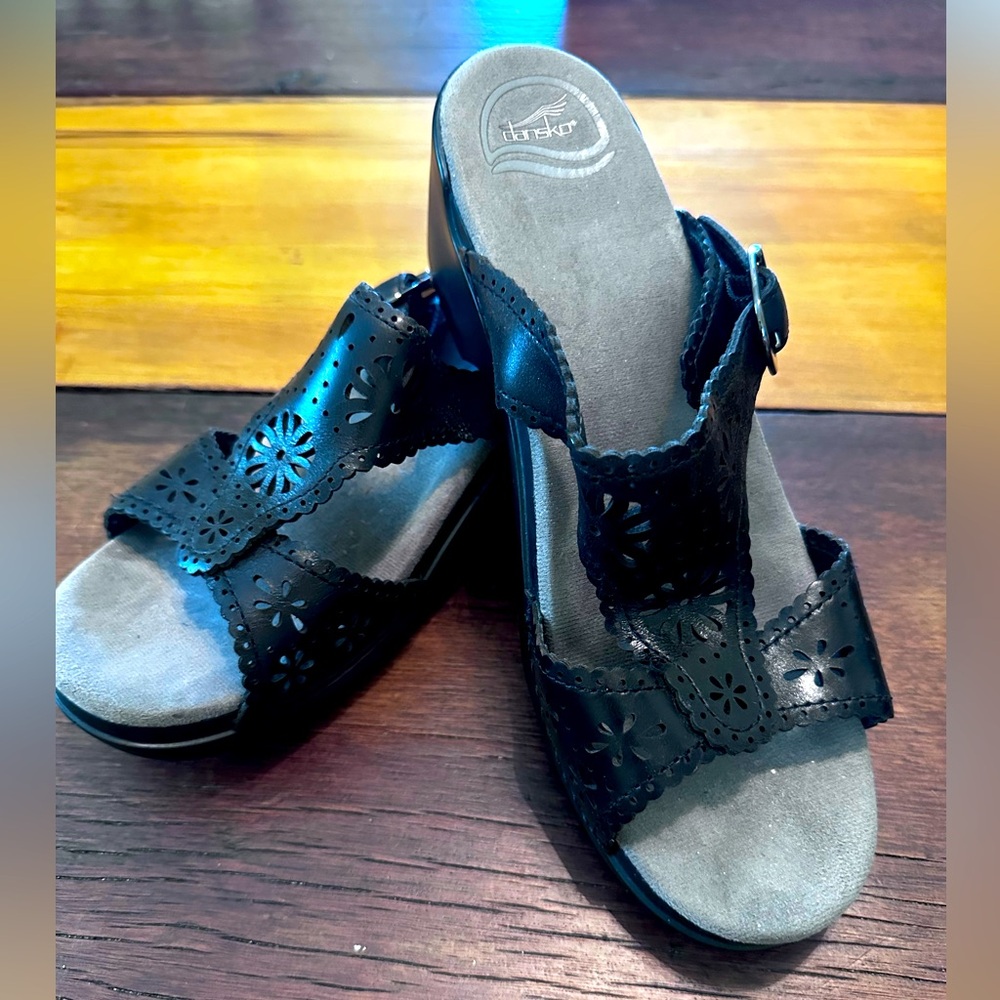 Women’s size 41 or 10.5 Black Leather Dansko Wedge Sandals with floral cut-outs